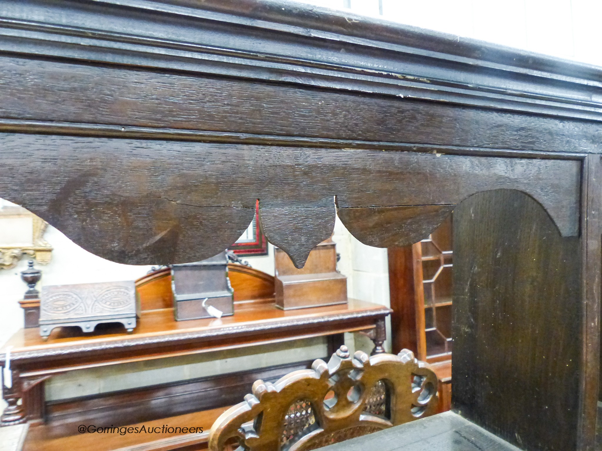 An 18th / 19th century oak three-shelf hanging plate rack, width 107cm, depth 18cm, height 98cm